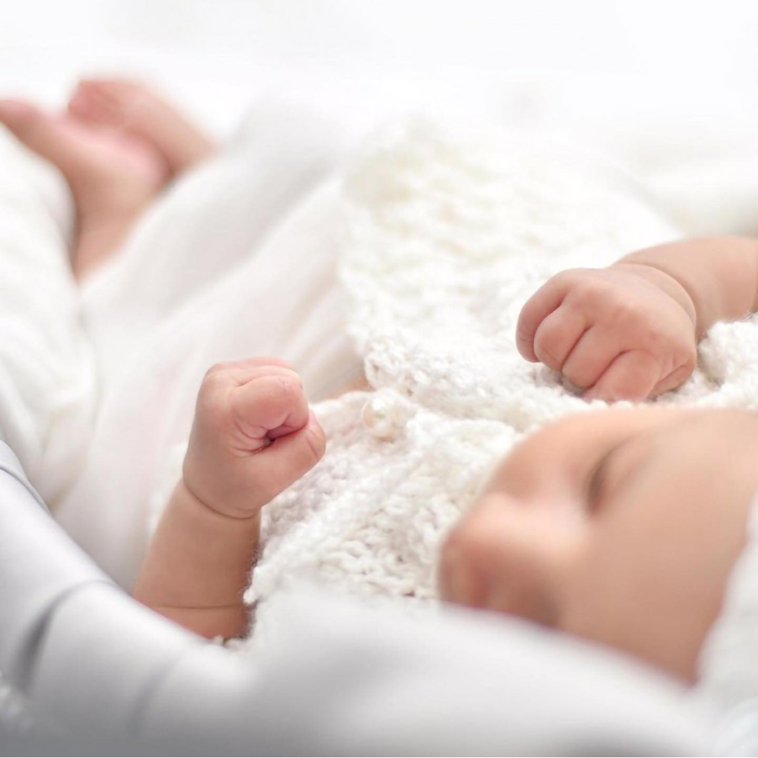 KNITTED BABY CLOTHES